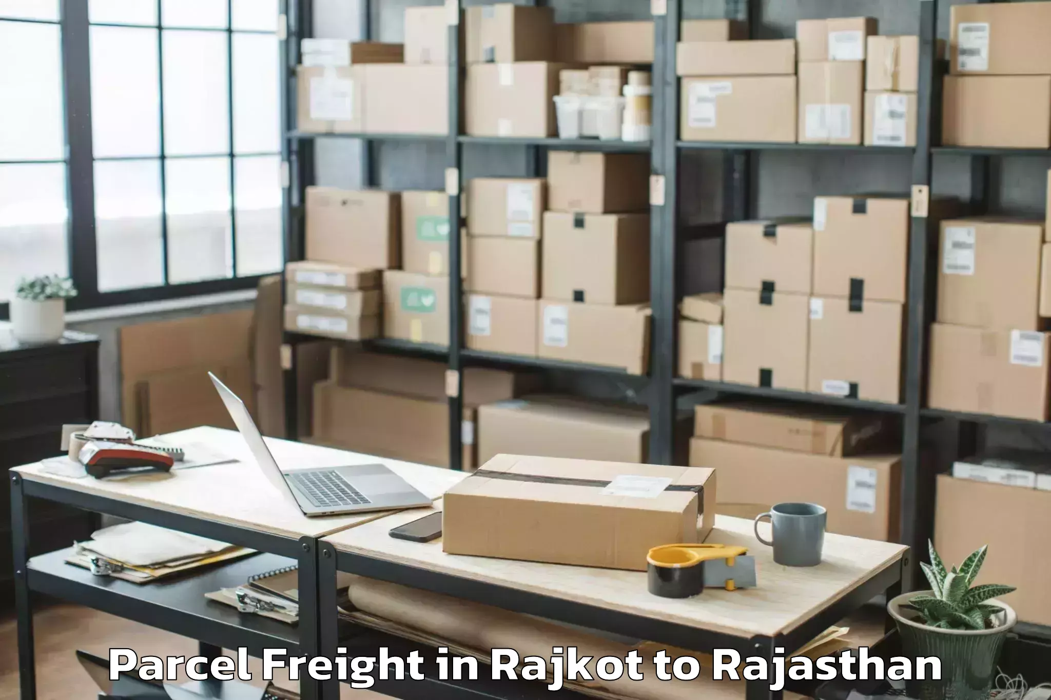 Quality Rajkot to Khajuwala Parcel Freight